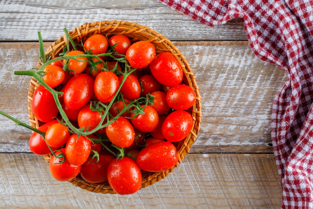 red-tomatoes-wicker-basket-wooden-kitchen-towel-flat-lay (1).jpg